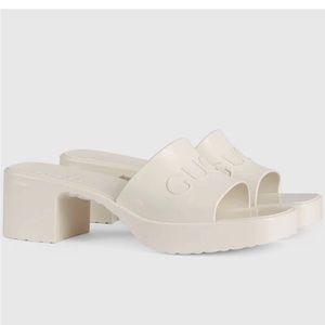 Gucci 
Women's Rubber Slide Sandals